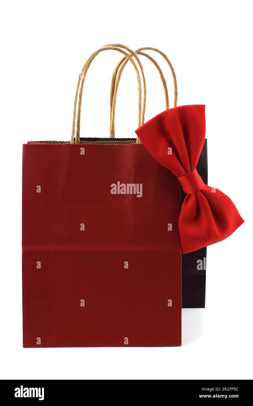 Black and red paper shopping bags with red bow tie Stock Photo