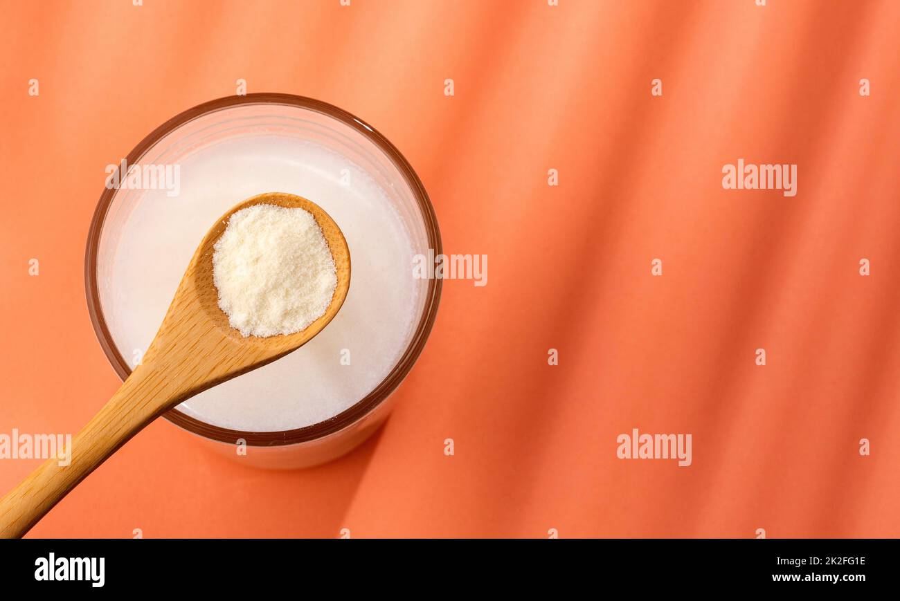 Glass of fresh liquid and powdered milk Stock Photo Alamy