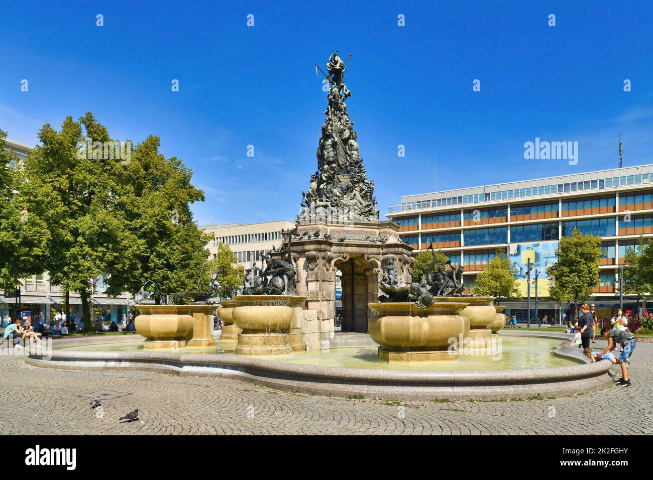 Mannheim, Germany - September 2022: Fountain with sculptures called 'Grupello Pyramid' with sculptures in square called 'Paradeplatz' in city center Stock Photo