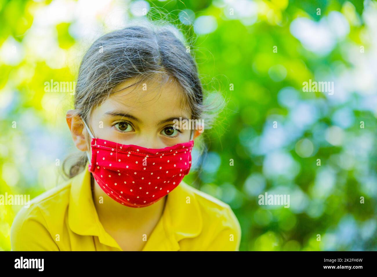 Little girl with mask Stock Photo Alamy