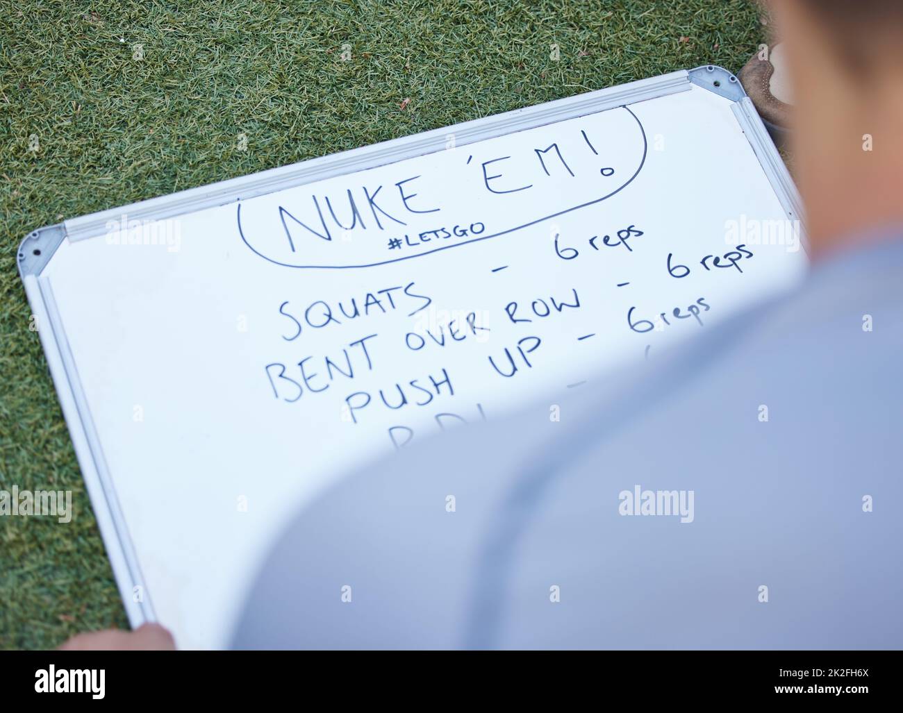This workout plan has me so excited shot of a trainer creating a