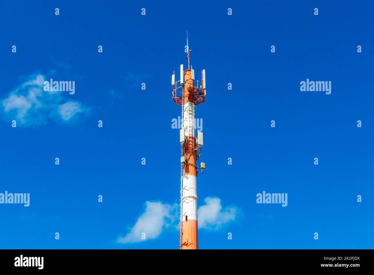 Red white 5G tower radiation in Playa del Carmen Mexico. Stock Photo