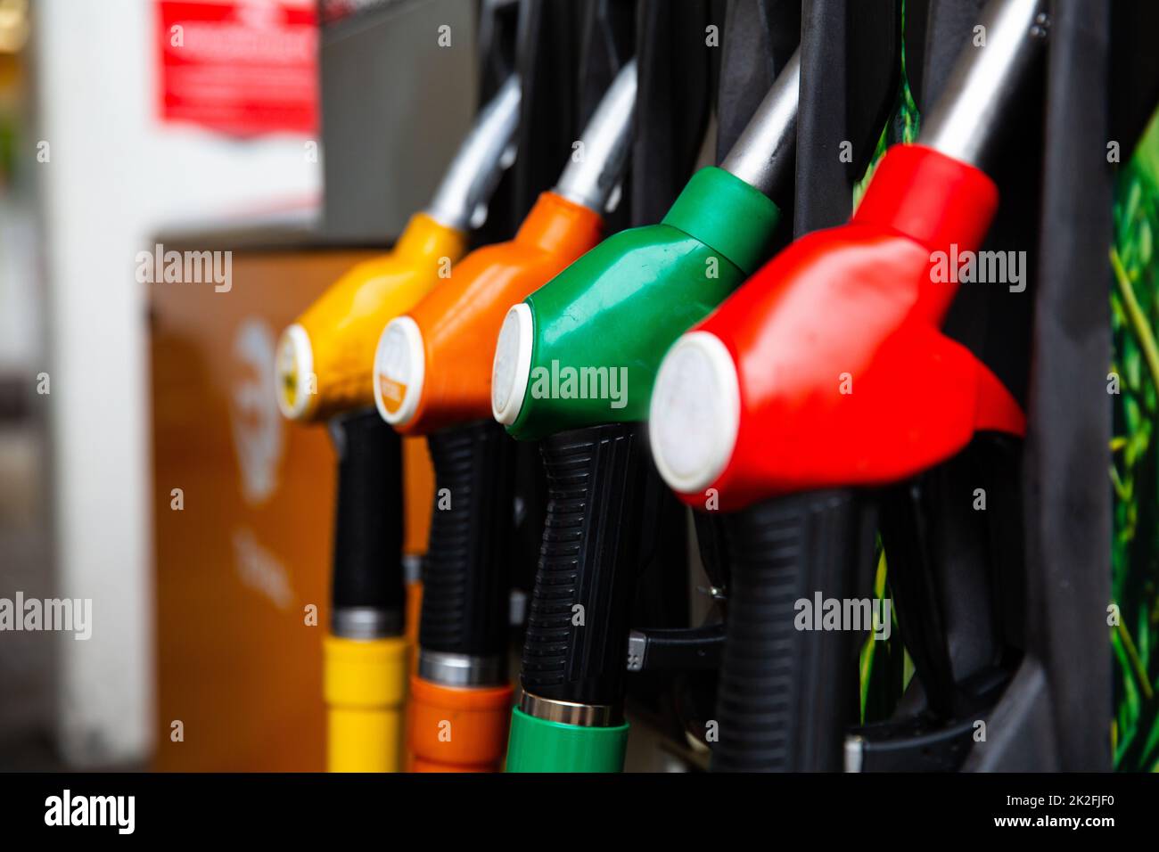 Detail of a petrol pump in a petrol station. Blue, green, red, golden colors. Stock Photo