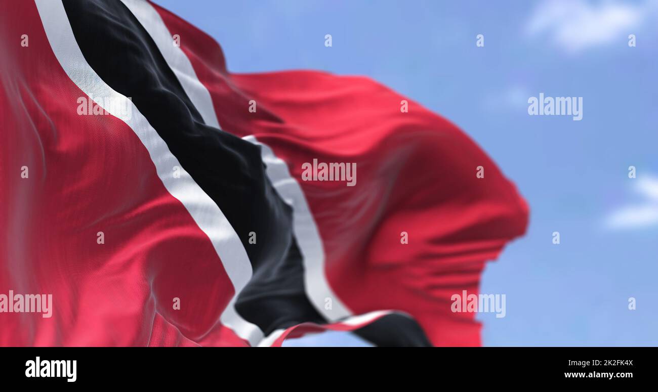 Detail of the national flag of Trinidad and Tobago waving in the wind on a clear day Stock Photo