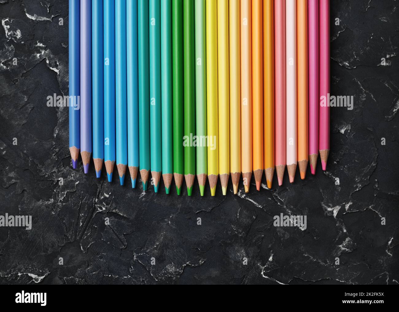 Rainbow colored pencils Stock Photo