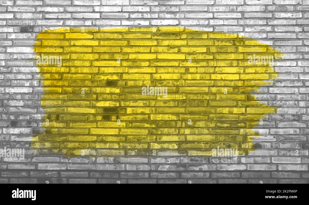Grunge grey brick wall with yellow color Stock Photo