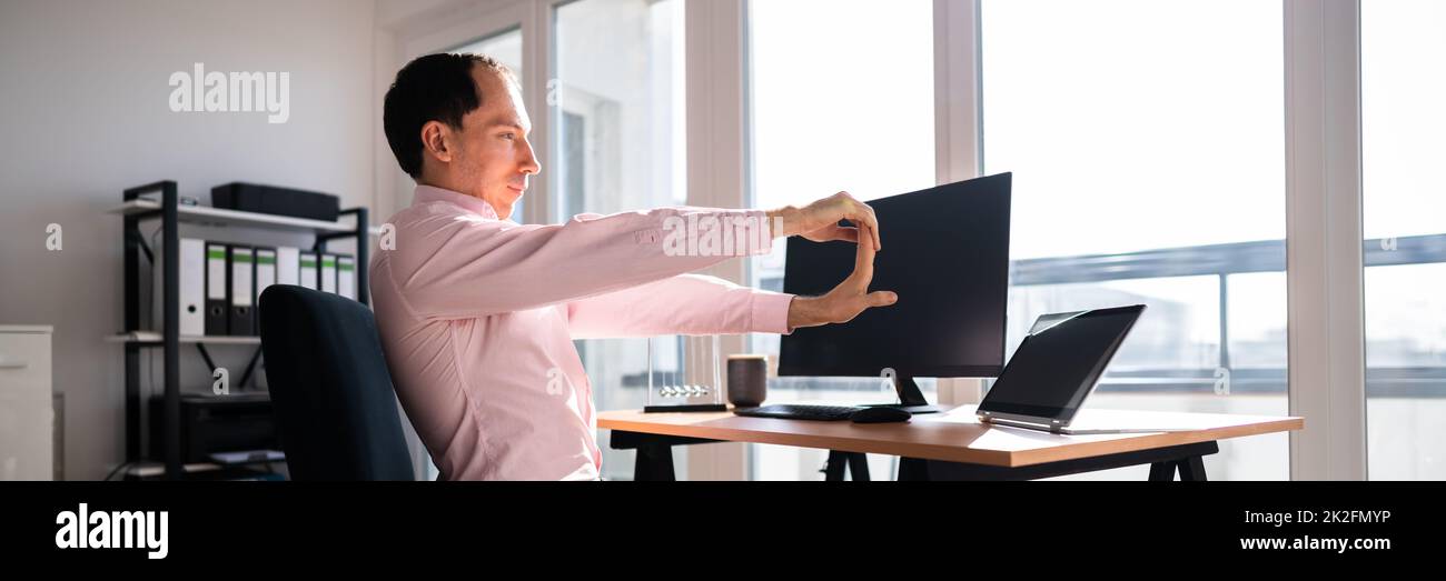 Stretching Office Workout. Desk Stretch Exercise Stock Photo