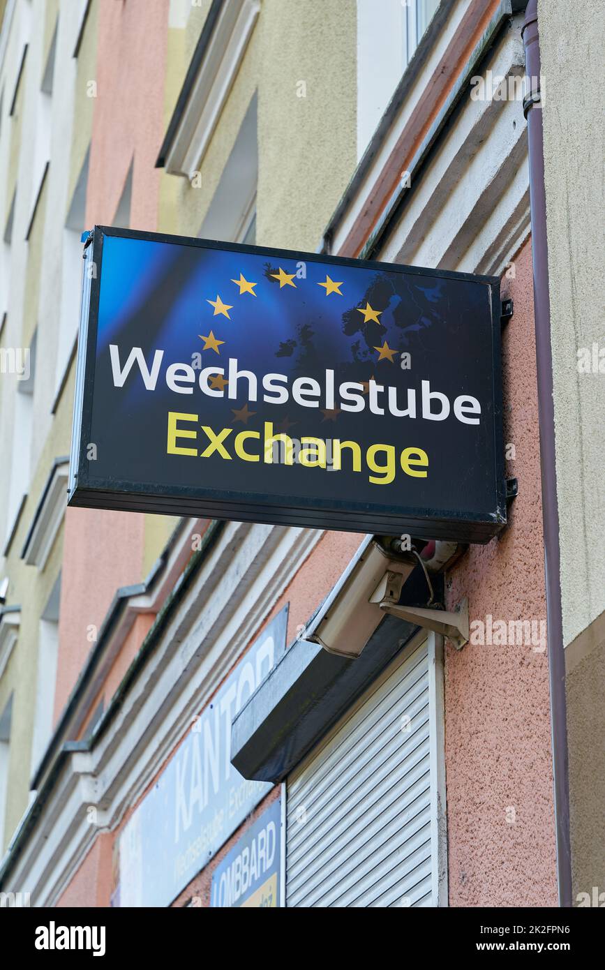 Illuminated sign of an exchange office for tourists in the center of Kolobrzeg in Poland Stock Photo