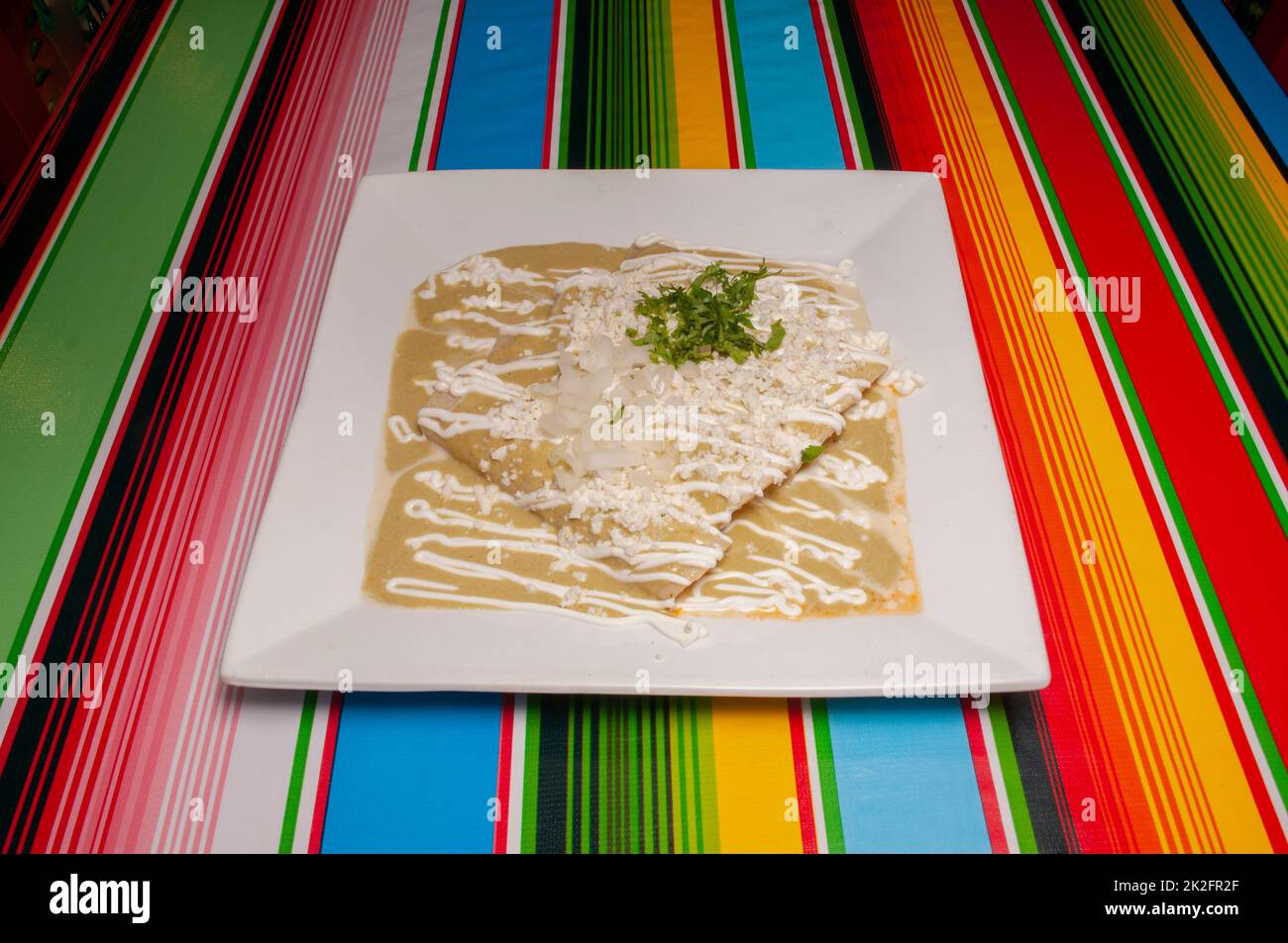 Mexican Green Enchiladas Stock Photo Alamy