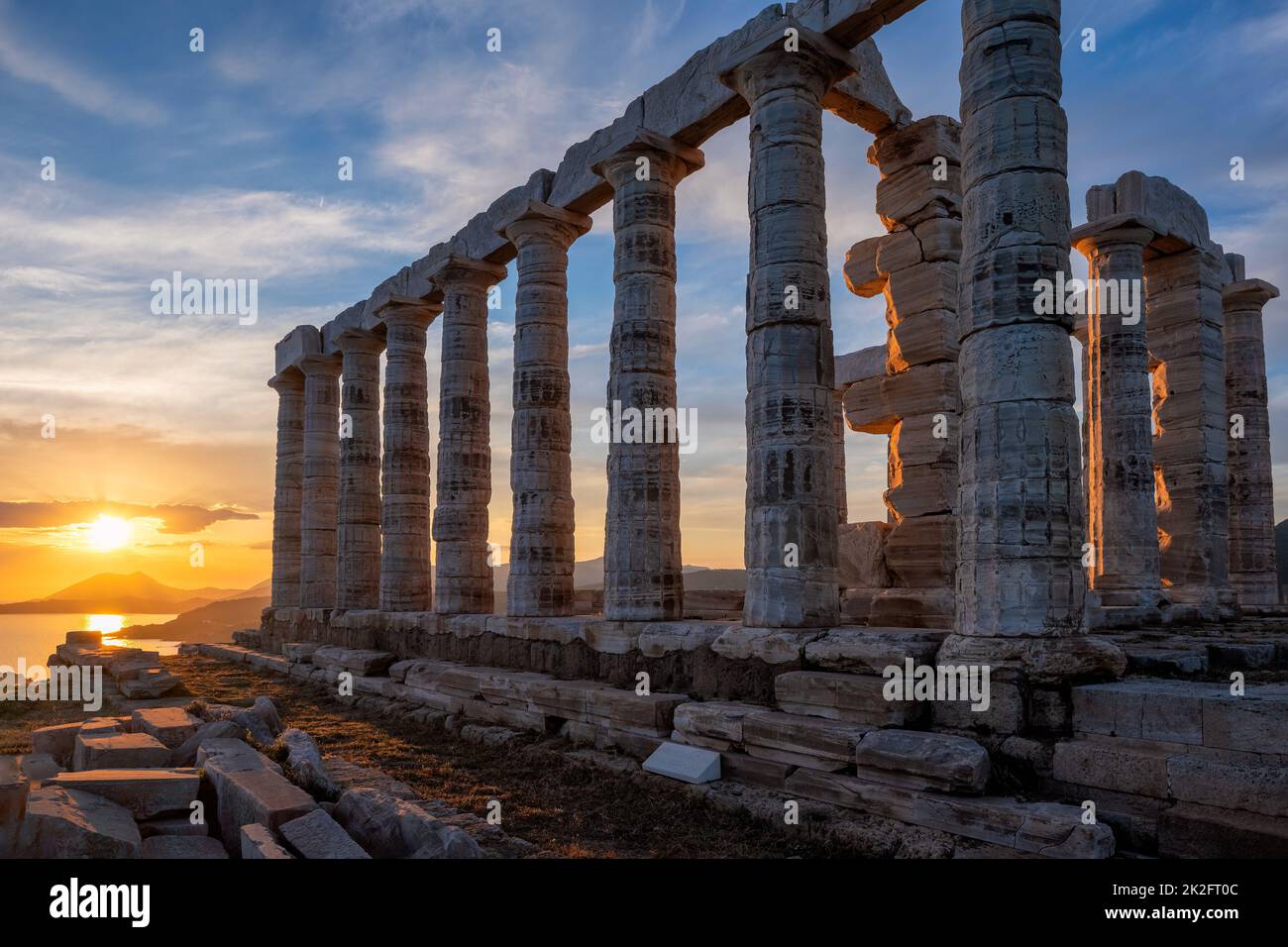 Poseidon temple ruins on Cape Sounio on sunset, Greece Stock Photo