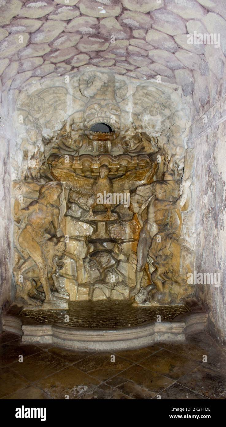 Stone fountain with sculptures Stock Photo