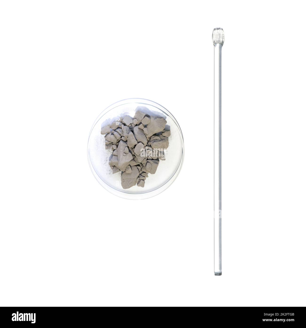 Aluminium powder in Chemical Watch Glass placed next to stirring rod. Closeup chemical ingredient on white laboratory table. Top View Stock Photo