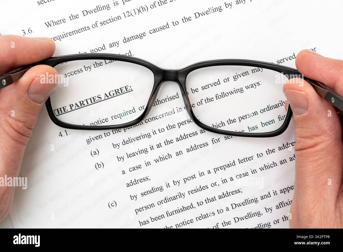Studying lease agreement Stock Photo