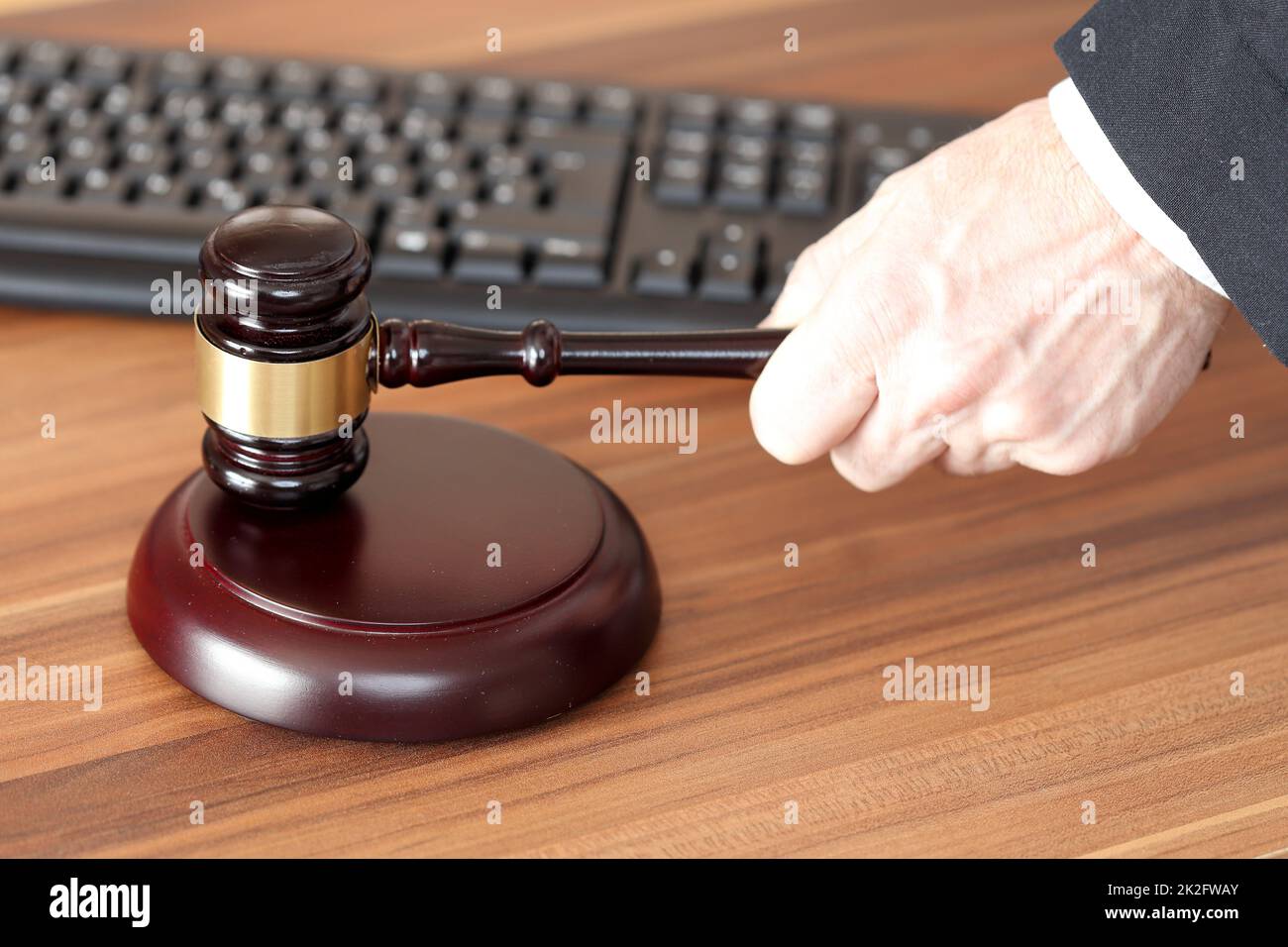 rights symbol with hammer and keyboard on table Stock Photo