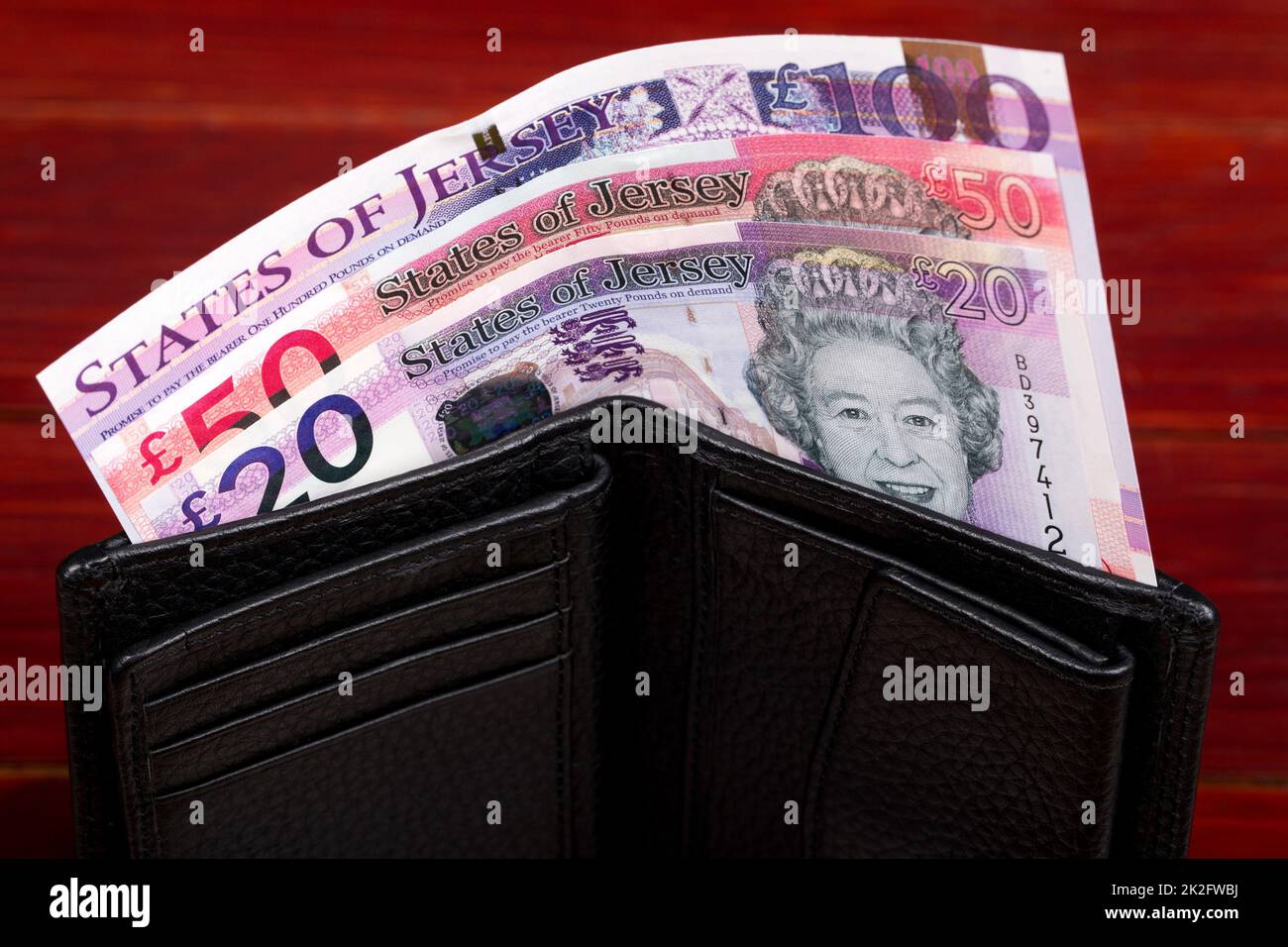 Jersey pounds in the black wallet Stock Photo - Alamy