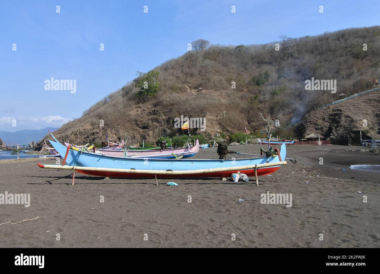 Beautiful View Around Teluk Cinta with ocean, trees, coast and blue sky in Jember, East Java, Indonesia. Stock Photo