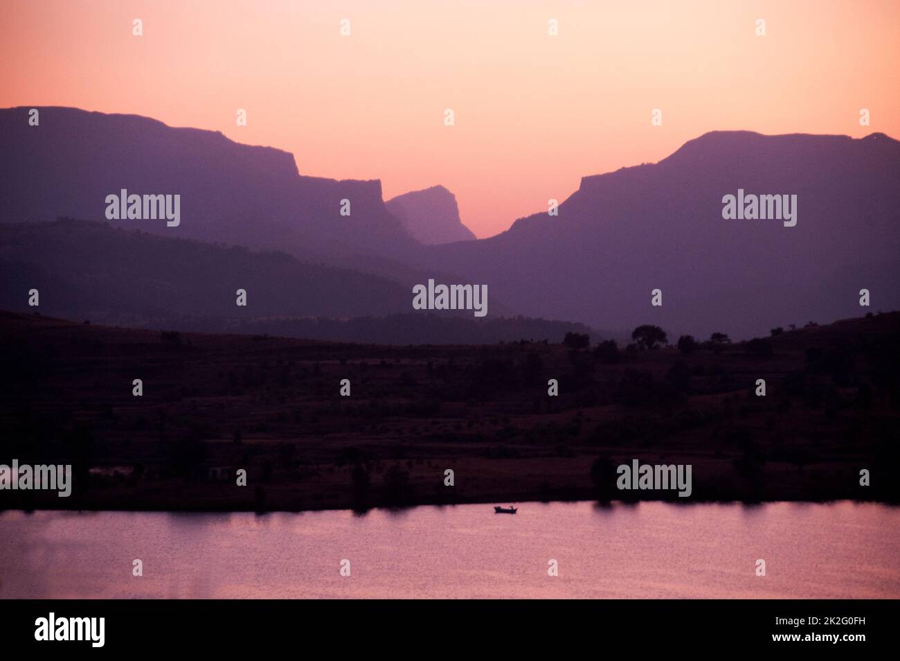 Sunset on Arthur lake at Bhandardara taluka Akole district Ahmednagar state Maharashtra India Stock Photo