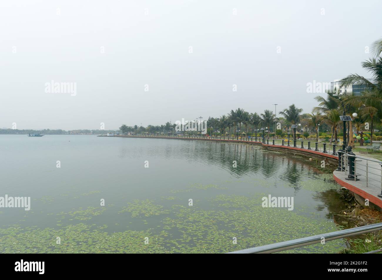 Lakeside promenade Landscape view along side lake inside Eco tourism park Kolkata India South Asia Stock Photo
