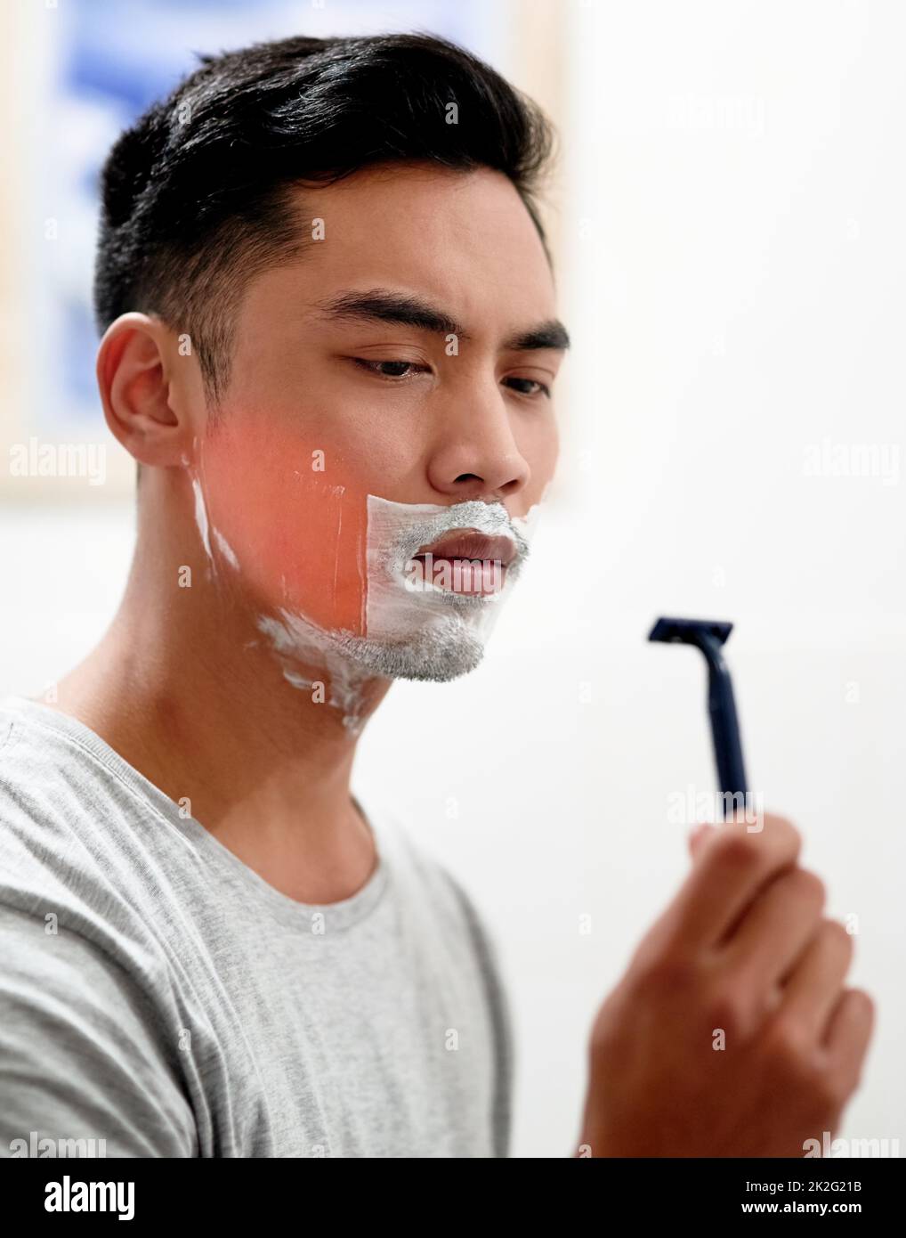 I really need to replace this. Shot of a young man at home getting