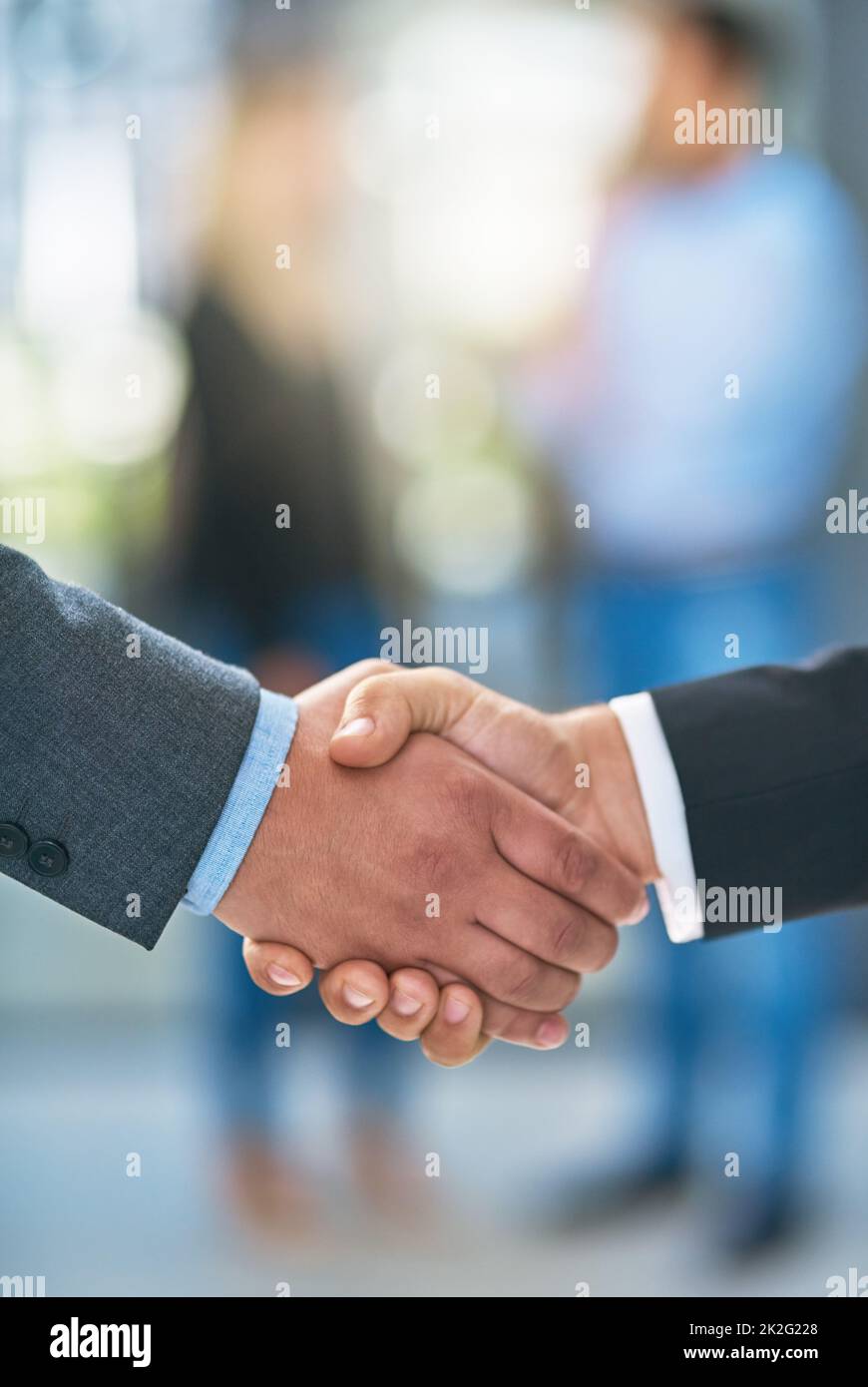 Forming successful mergers. Shot of businesspeople shaking hands. Stock Photo