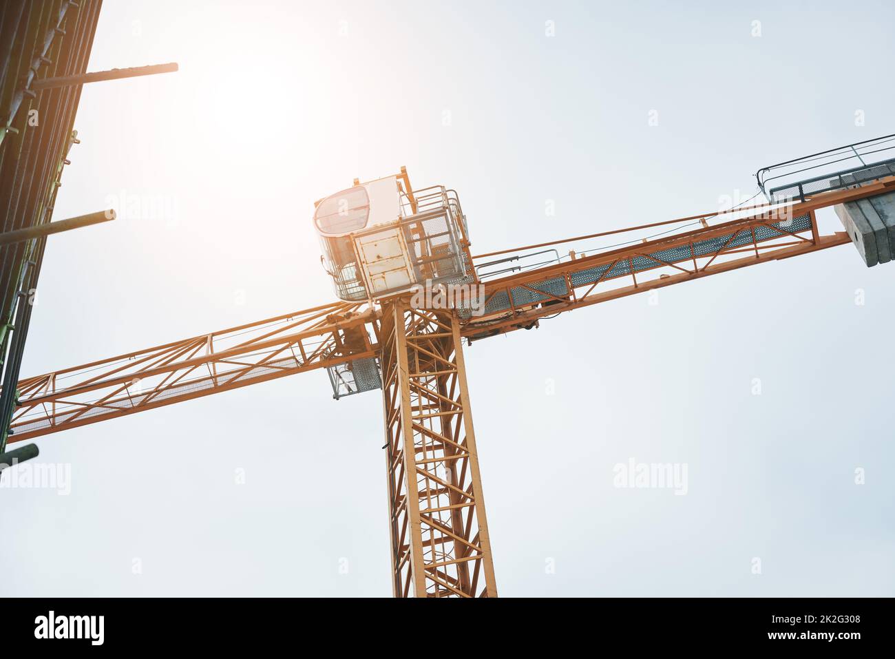 Leave the heavy lifting for me. Shot of a crane at a construction site. Stock Photo