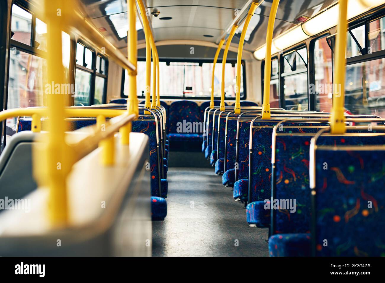 These seats need to be filled. Cropped shot of empty seats on a public bus. Stock Photo