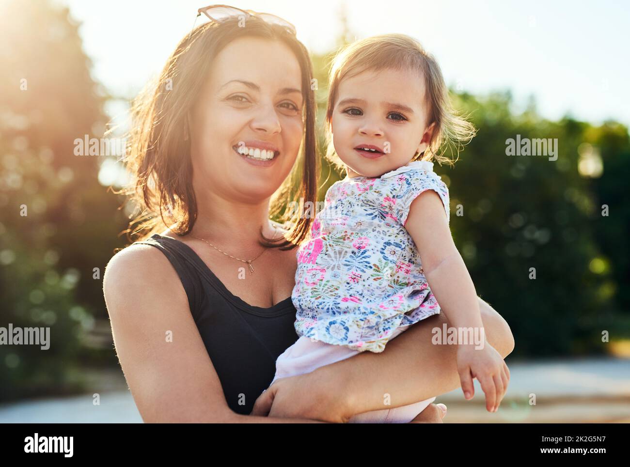 Mommys best friend. Shot of a young mother and her little girl outdoors. Stock Photo