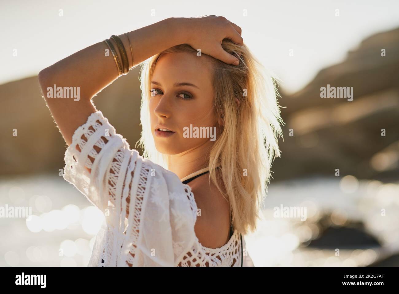 Woman young posing at on the beach hi-res stock photography and images ...