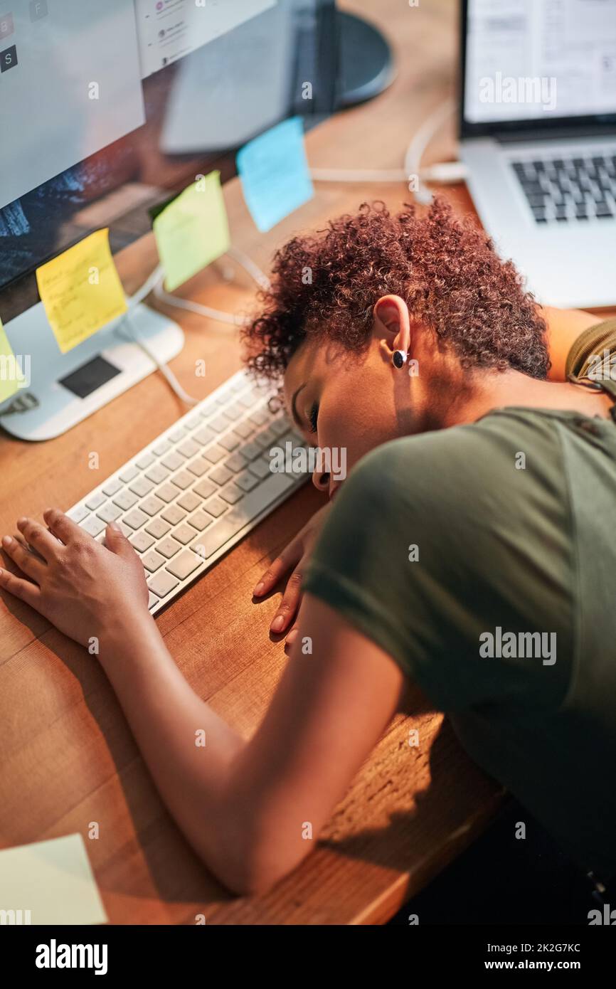 Shes been burning the candle at both ends. Shot of an exhausted young