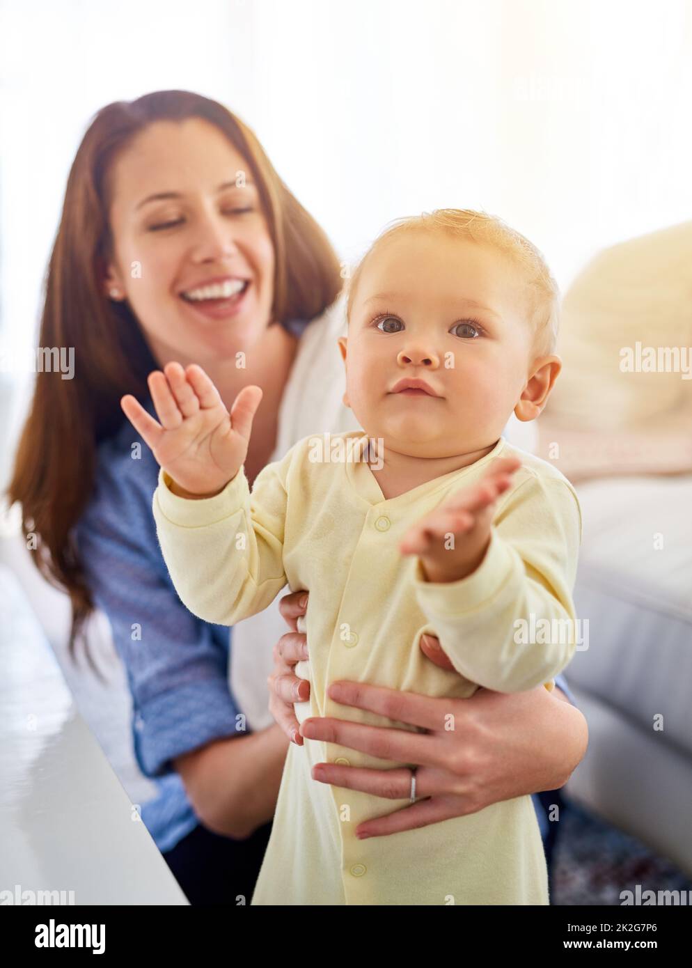 Thats my jam, mom. Shot of a mother spending time with her baby boy. Stock Photo