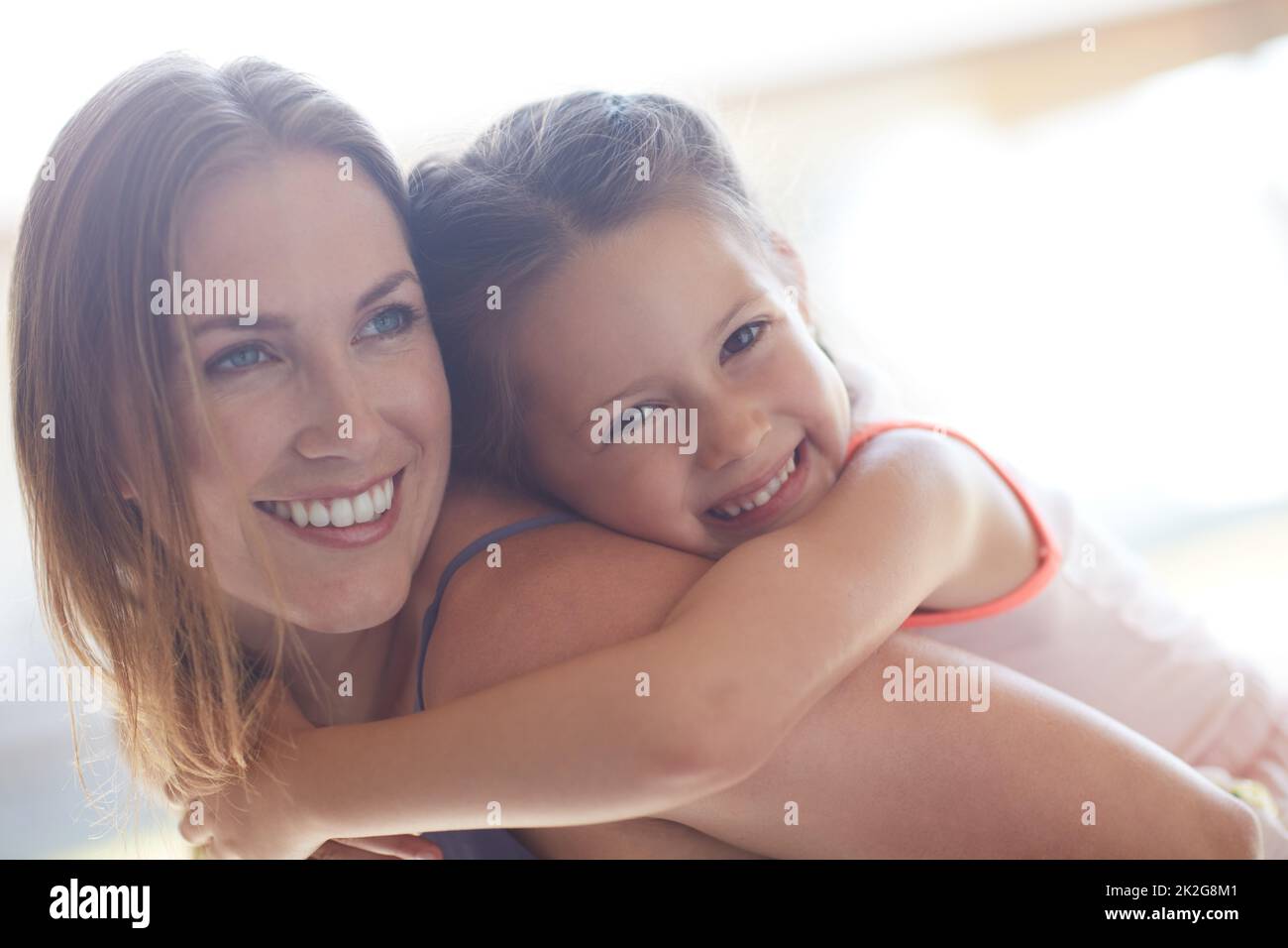 They have so much love for each other. Cropped shot of a mother and daughter spending time together at home. Stock Photo