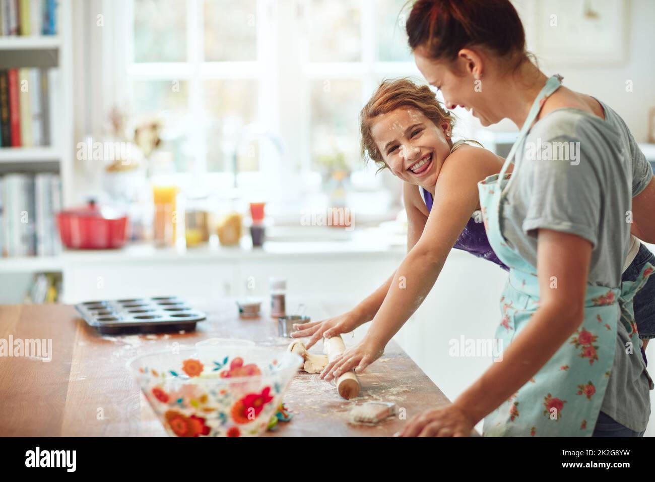 My favourite part. Shot of a mother and daughter preparing food in the