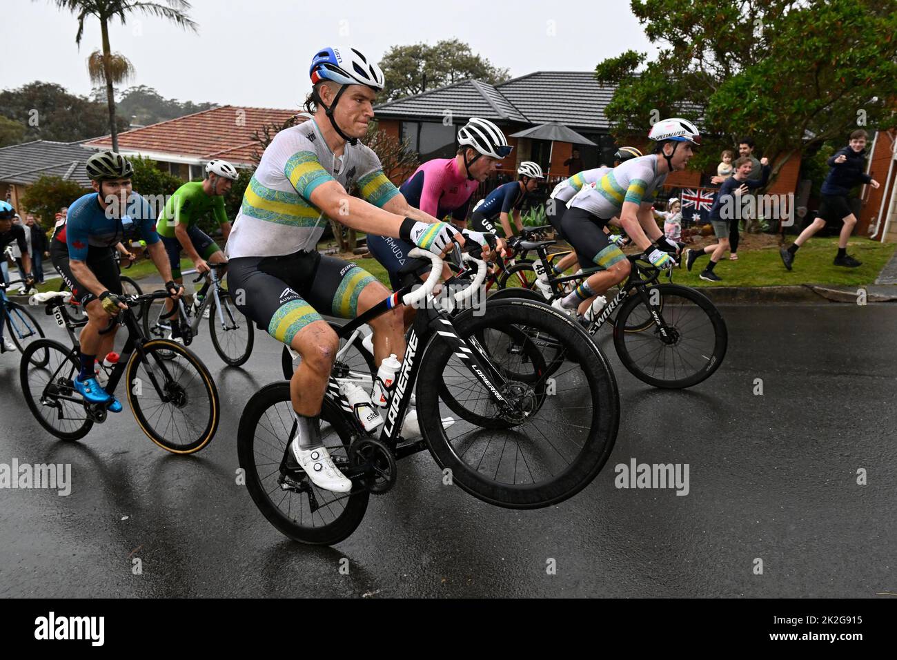 Australian Jensen Plowright does a wheelie during the U23 men road race at the UCI Road World