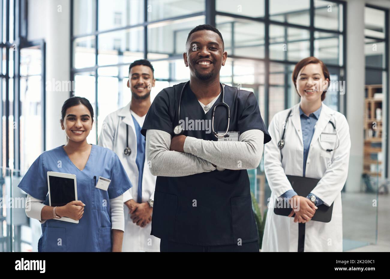 Were always proud to help those in need. Shot of medical staff together at work. Stock Photo