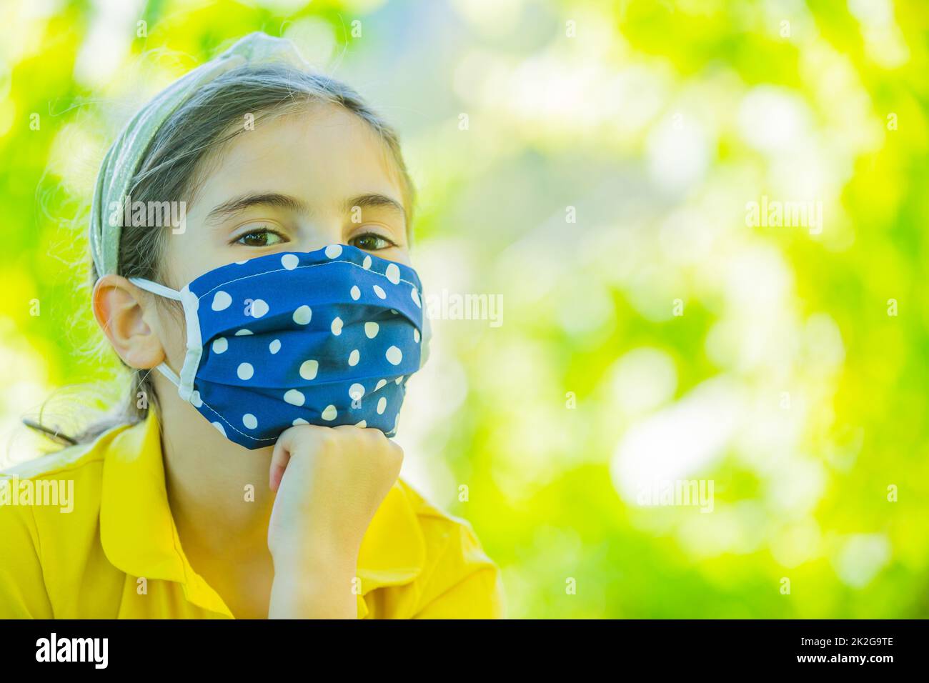 Little girl with mask Stock Photo Alamy