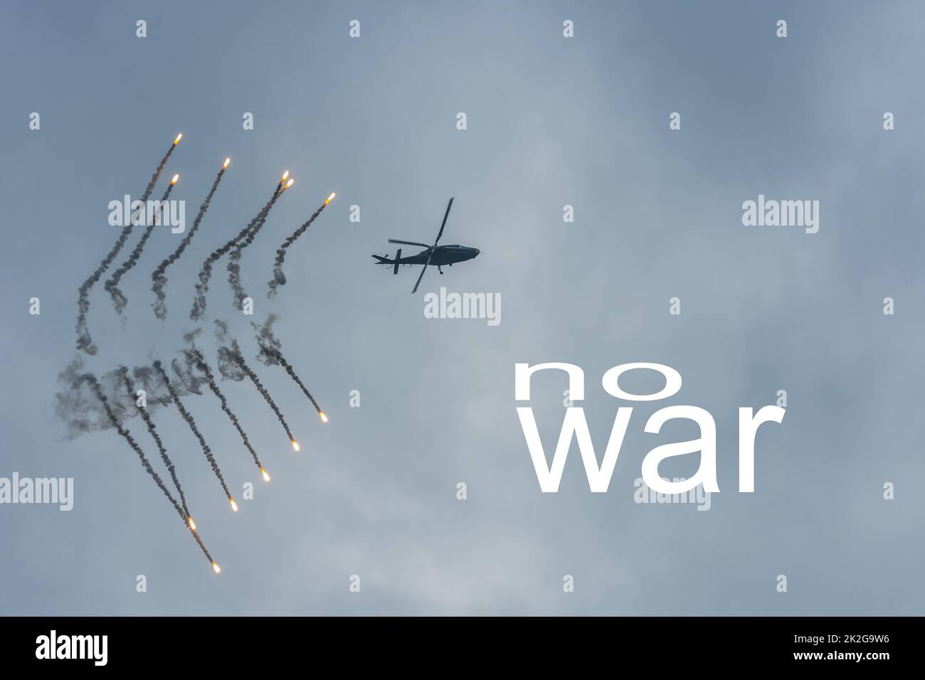no war military helicopter with subsequent defensive measures Stock Photo