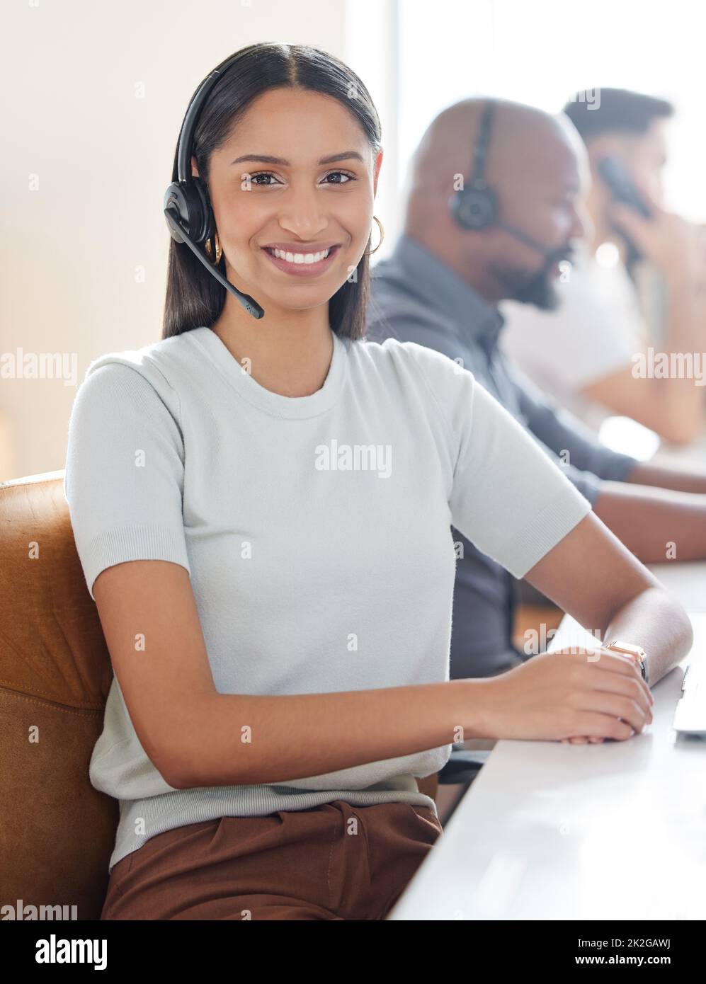 Im so happy to have reached my target today. Portrait of a young businesswoman working in a call centre. Stock Photo