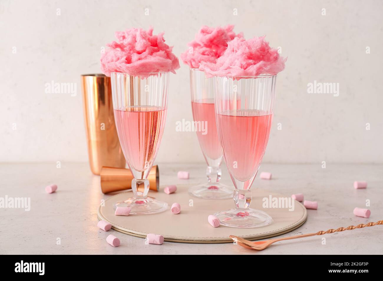 Glasses with tasty cotton candy cocktail on light background Stock Photo Alamy