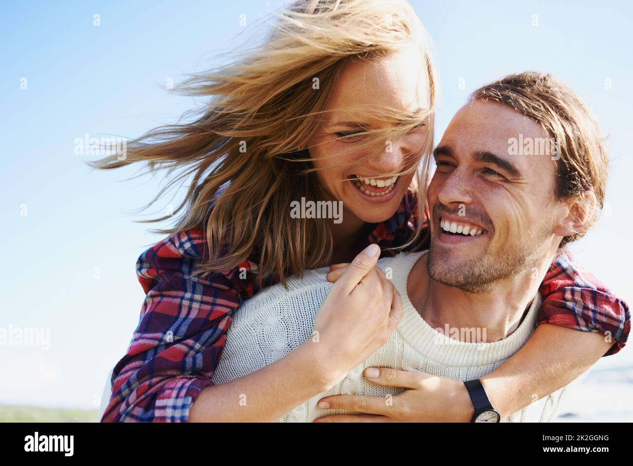 The joy of being in love. Shot of an affectionate young couple spending time together outdoors. Stock Photo