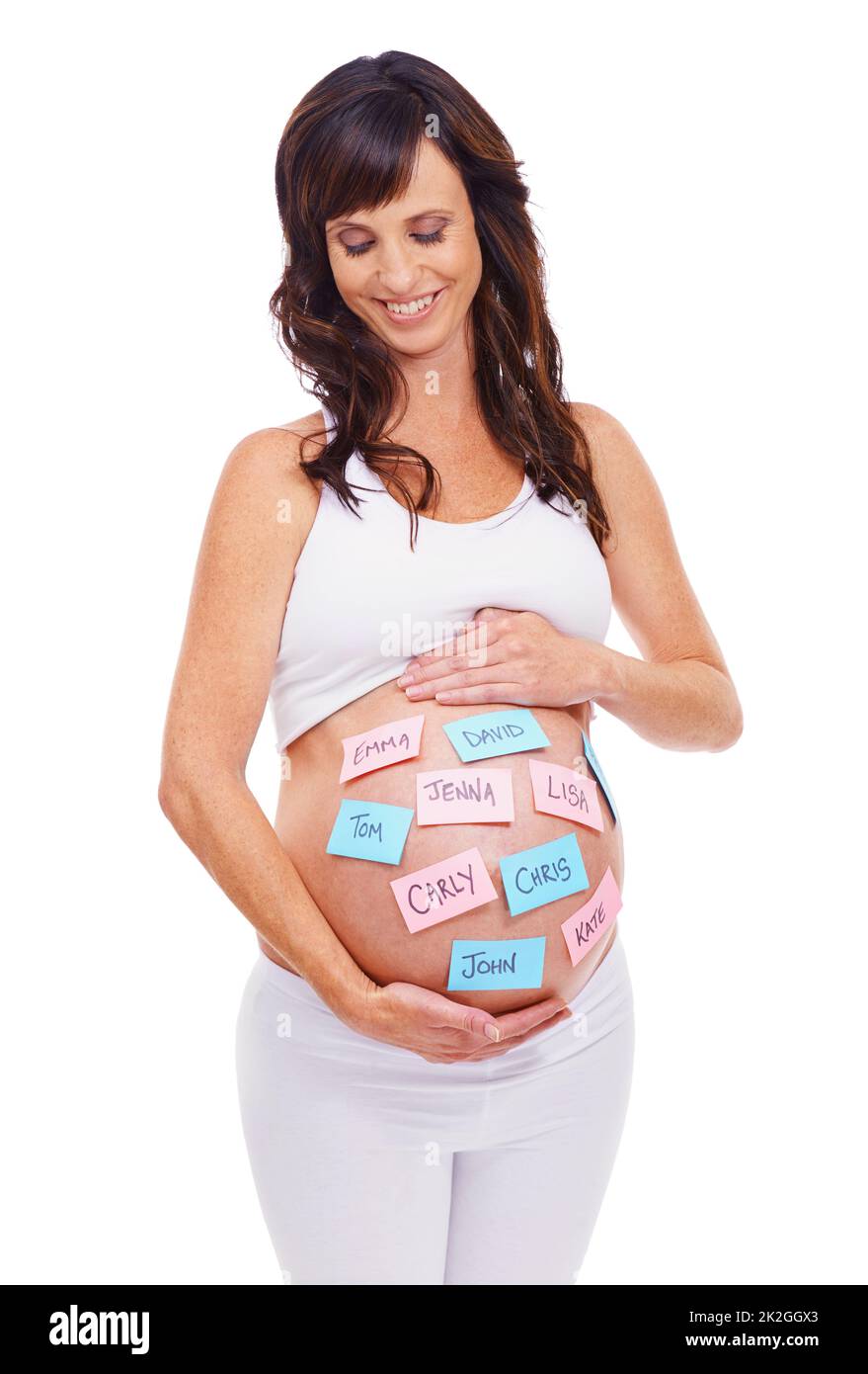 Whats in a name...A pregnant woman with post-it notes on her stomach with a selection of baby names. Stock Photo
