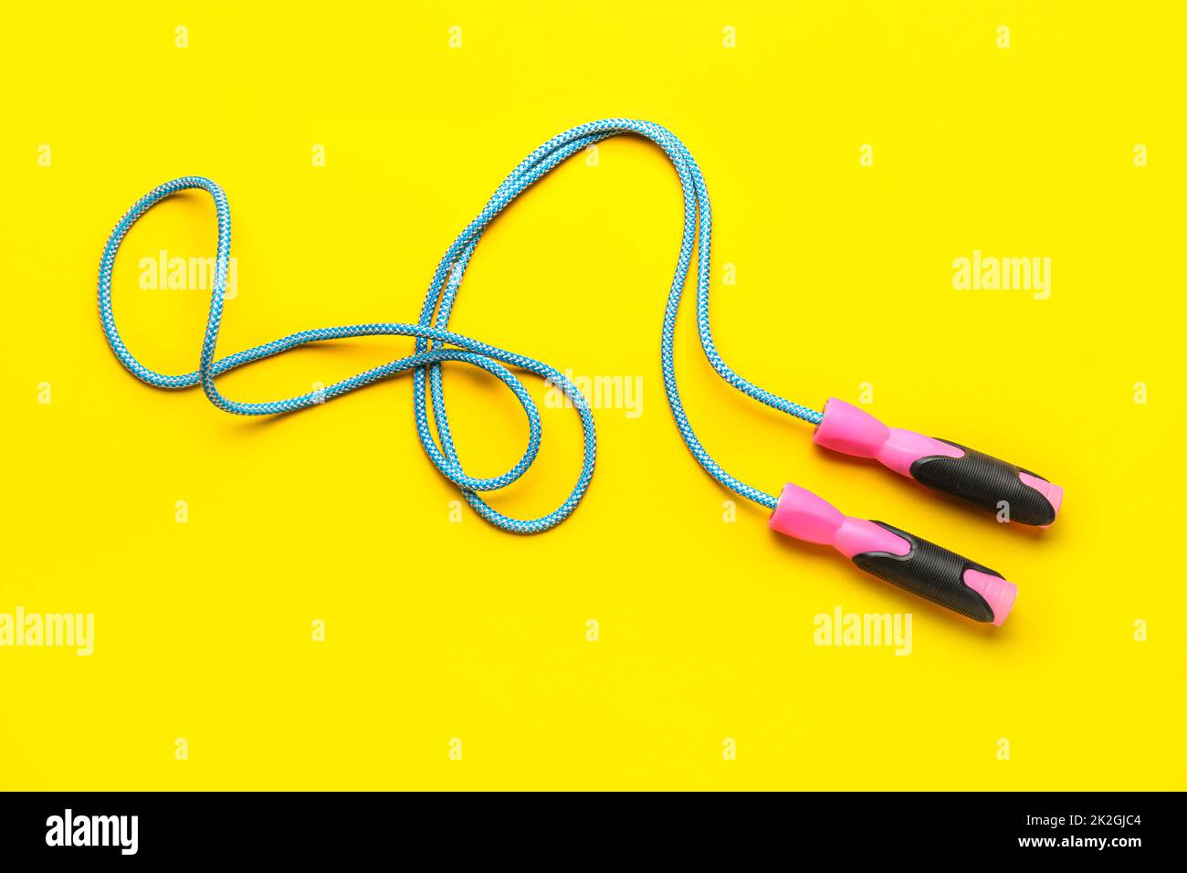 Skipping Rope Photo Example Skipping rope on yellow background Stock Photo - Alamy