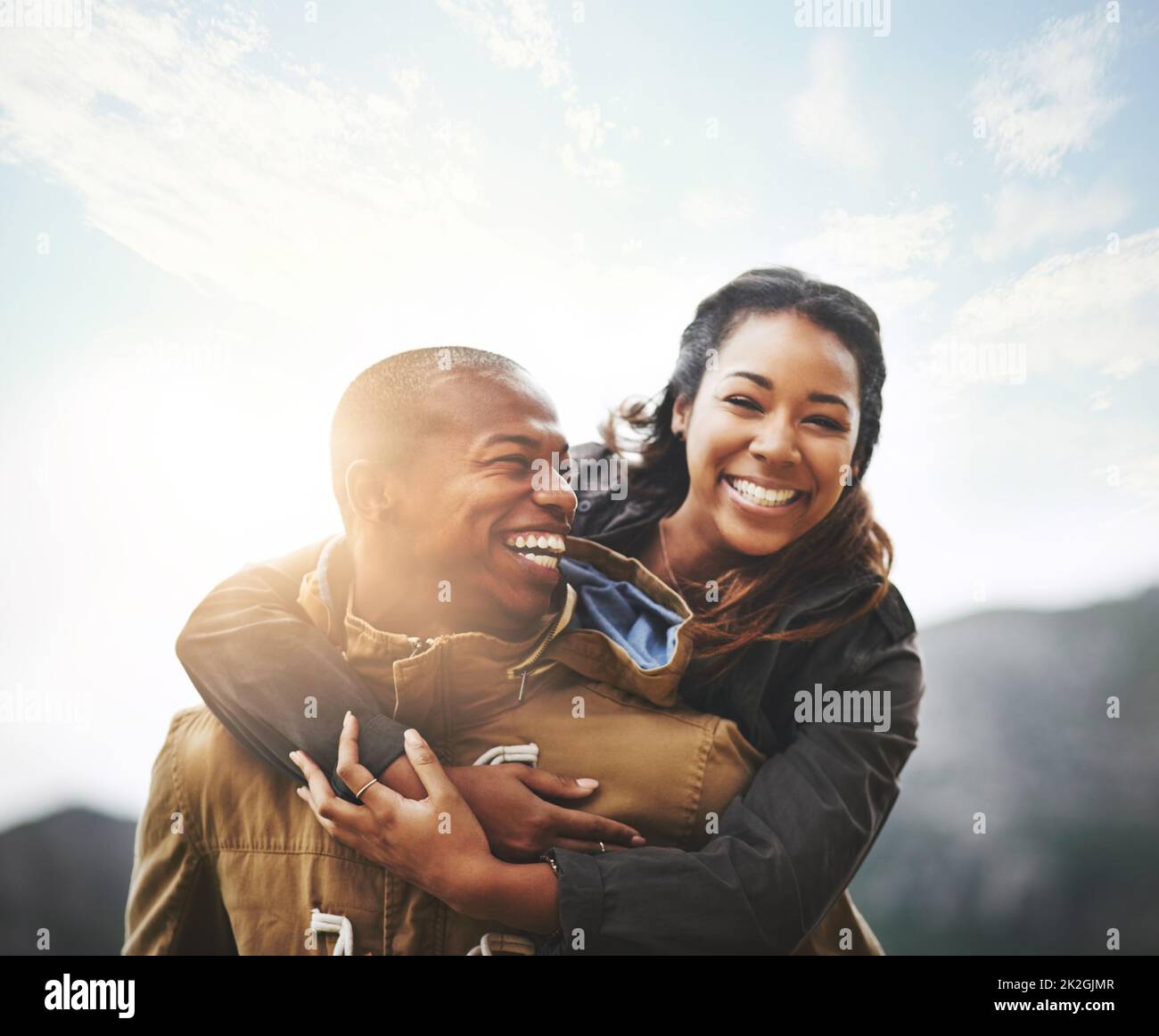 Making a moment for us. Portrait of a happy young couple having fun outside. Stock Photo