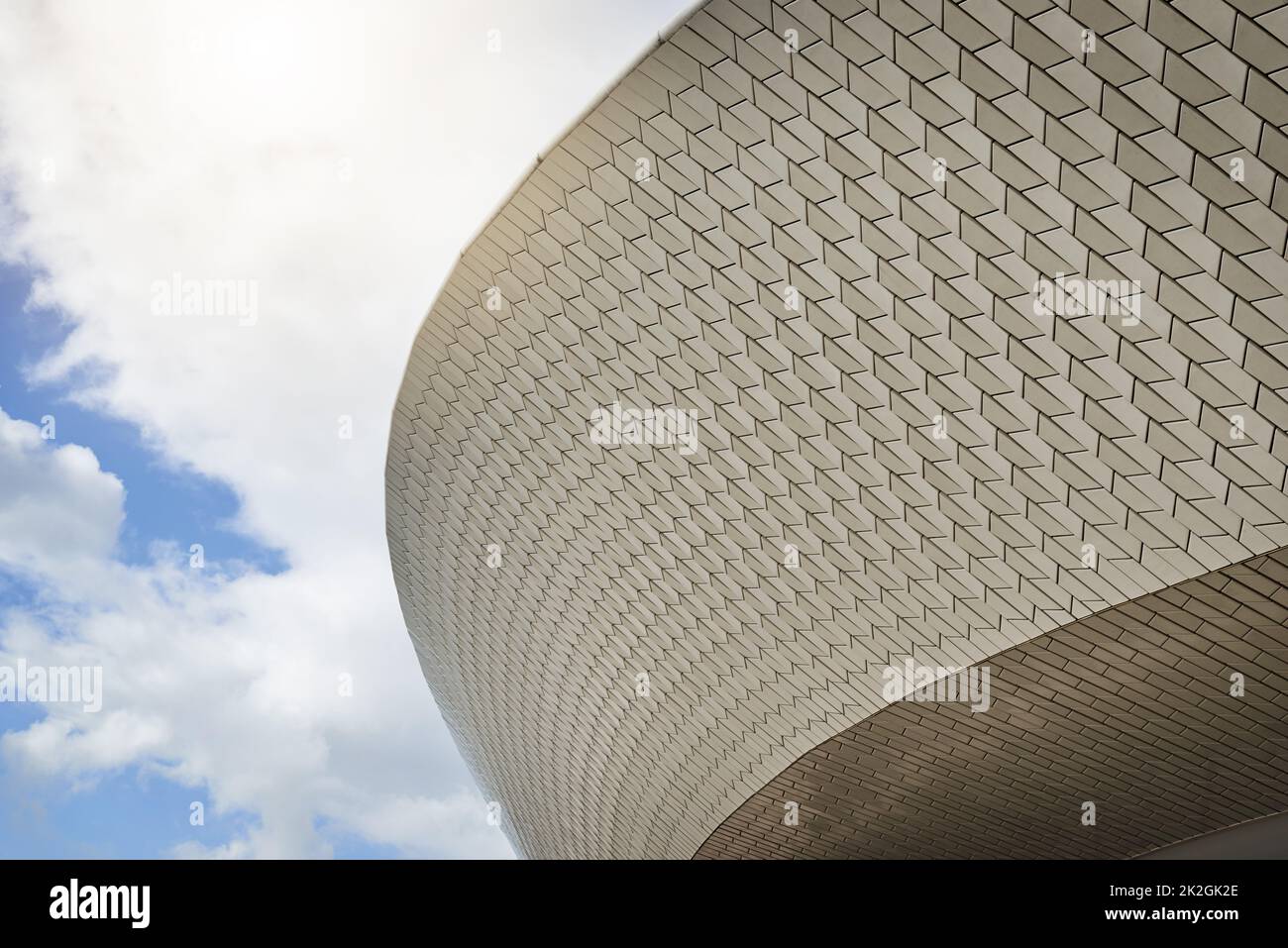 Its a world class stadium. Low angle shot of a sports stadium with clouds in the background