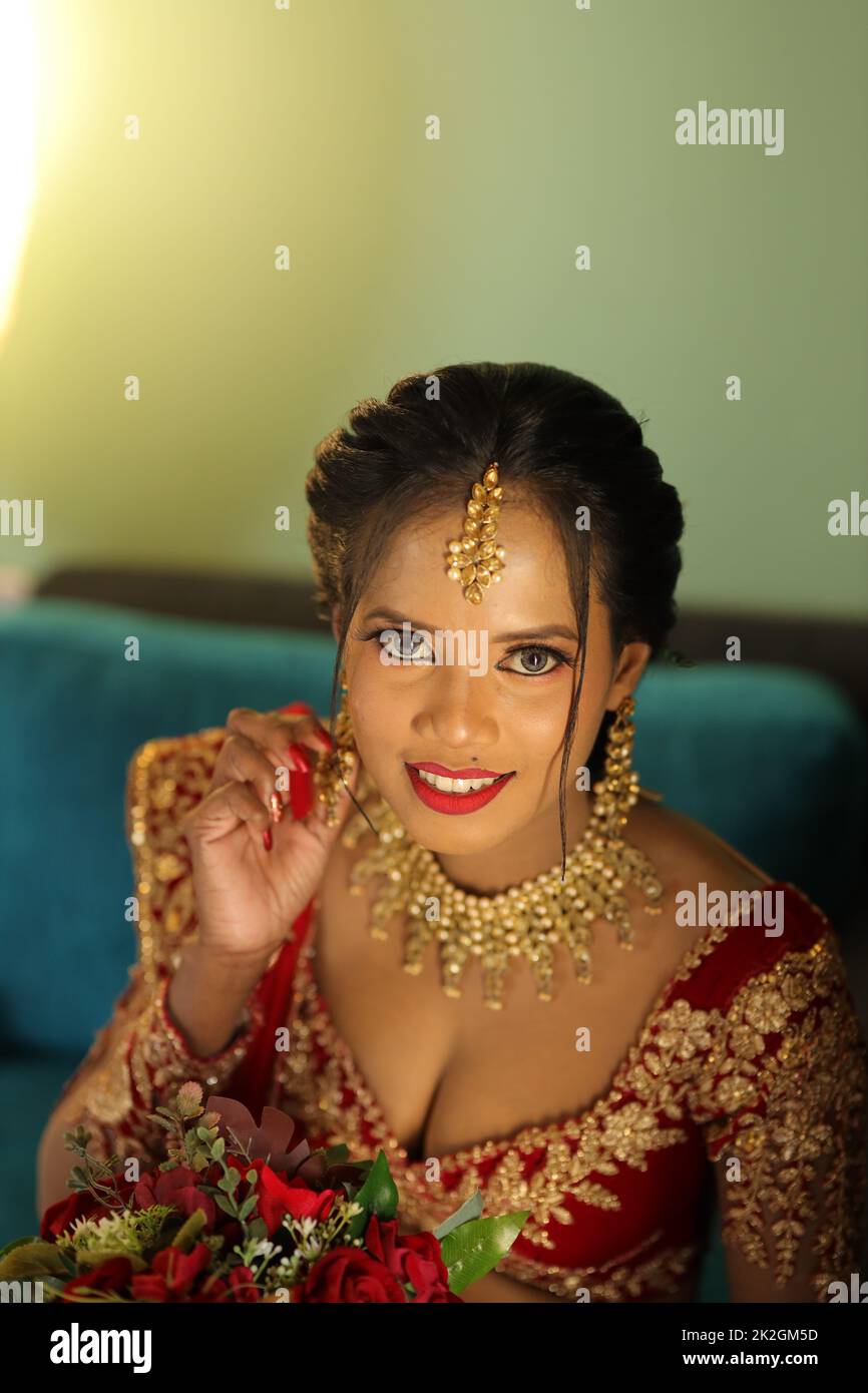Indian bridal red lehenga dress Stock Photo