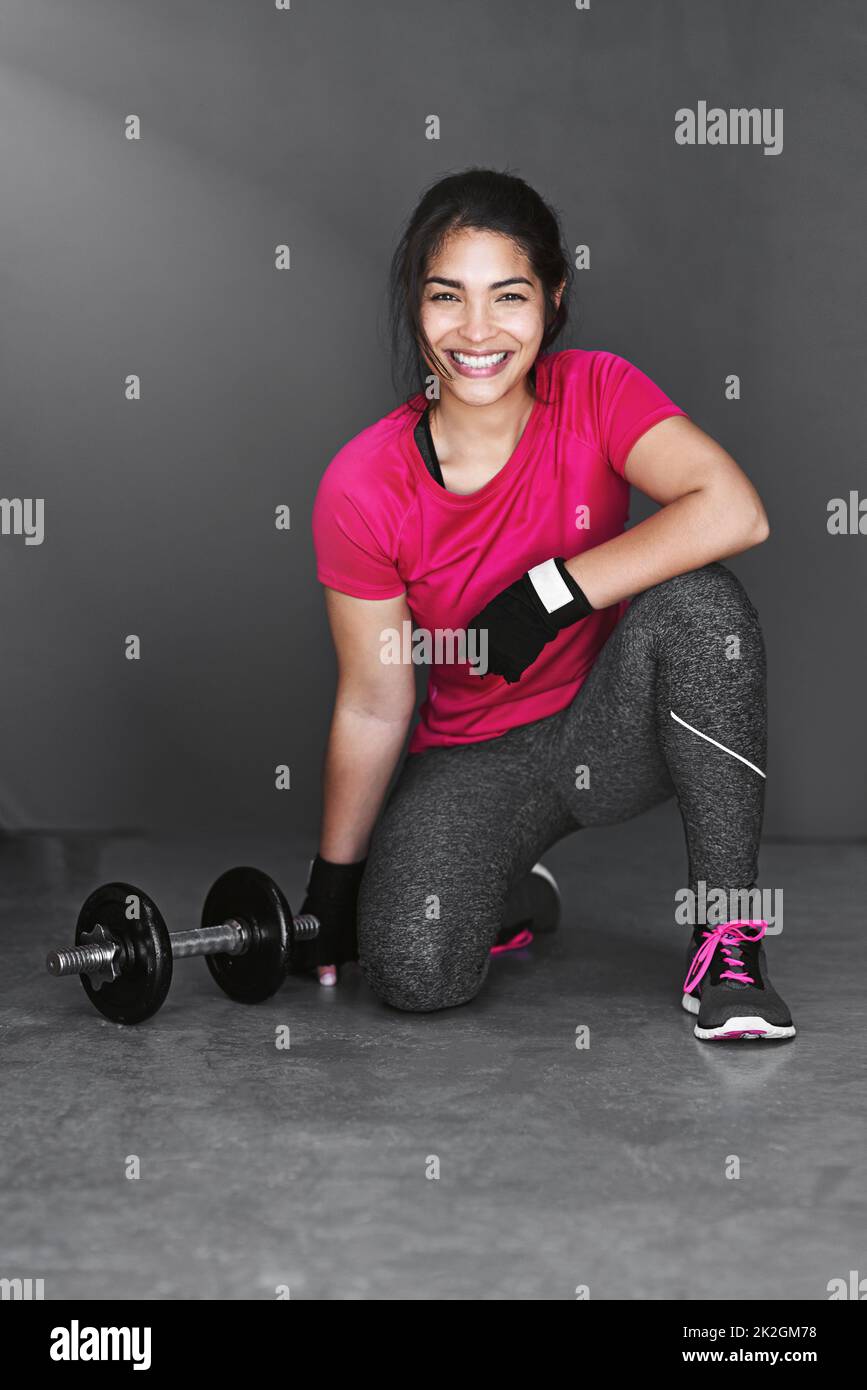 If youre a lifter, you cant be a quitter. Studio shot of an attractive