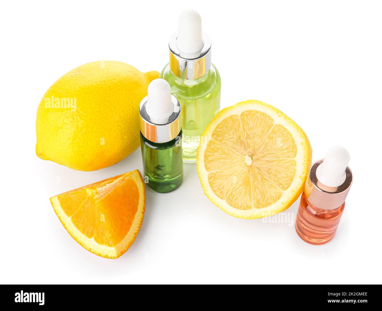 Bottles of citrus serum and fruits isolated on white background Stock ...