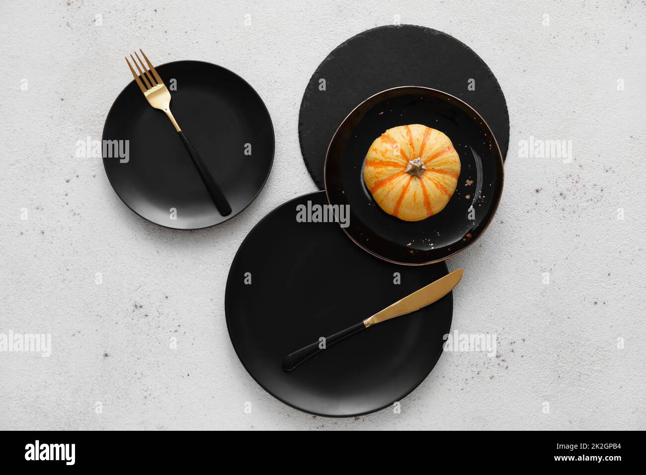 Autumn table setting with fresh pumpkin on white background Stock Photo ...