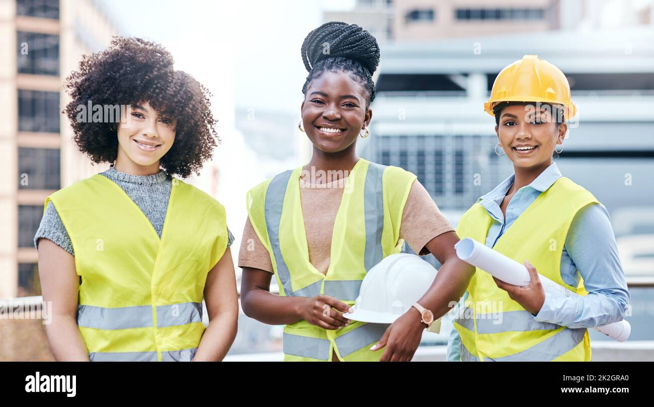 Supporting greater diversity to ensure the greatest success. Portrait of a group of confident young businesswomen working at a construction site. Stock Photo