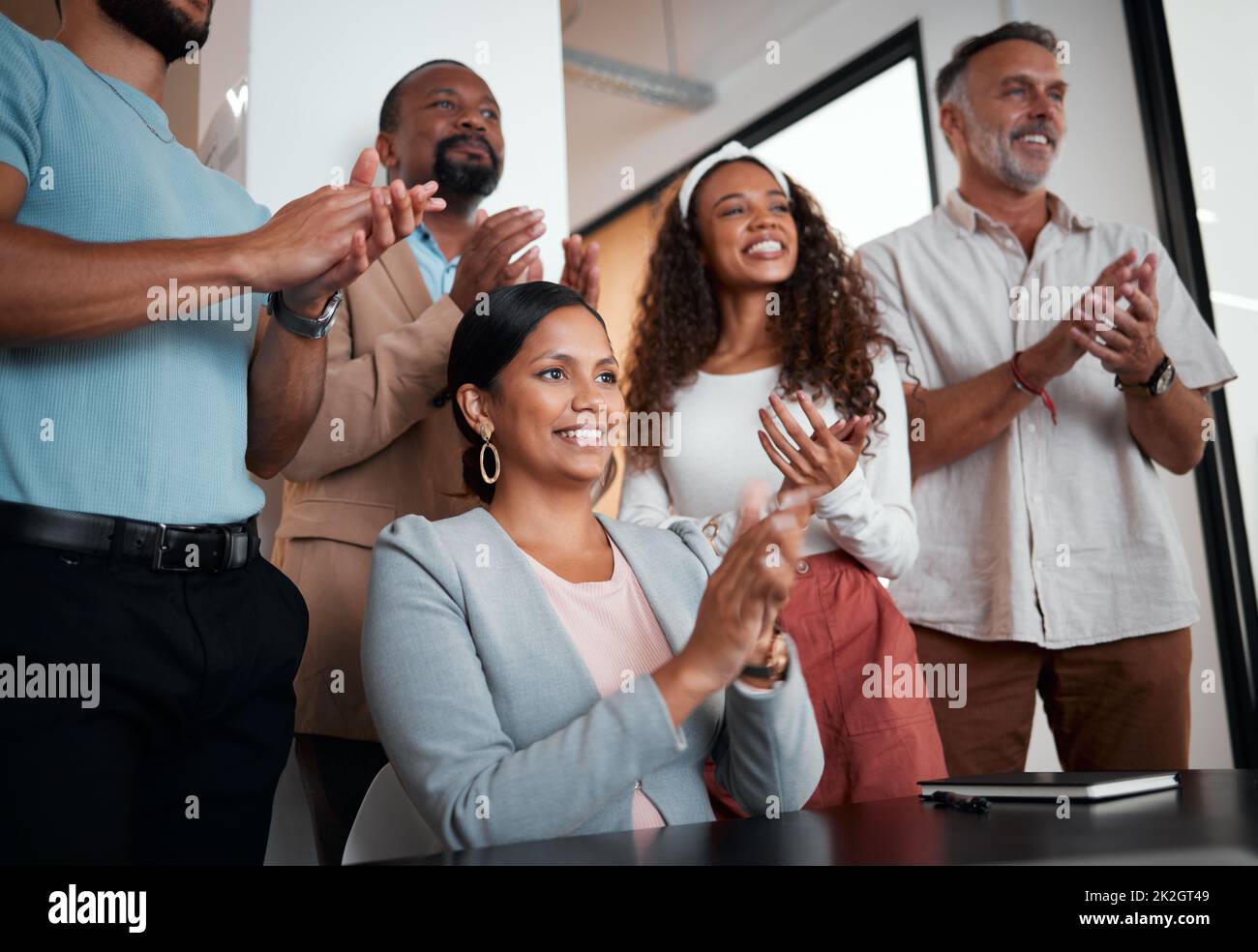 Were so happy to have you aboard. Shot of a group of businesspeople applauding. Stock Photo