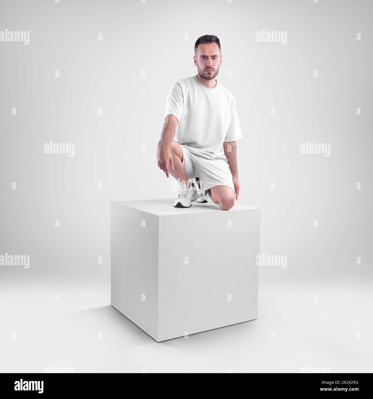 isolated mockup of trendy white men's oversized tshirt with shorts on